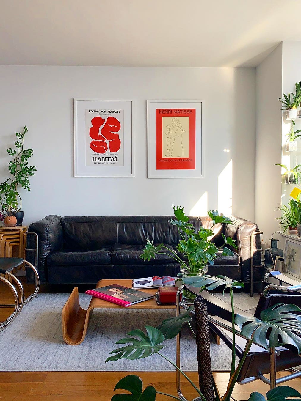 living room with black leather sofa