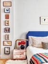 bed with blue headboard