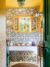 yellow tiled bathroom
