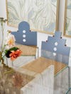 blue and striped chairs at table
